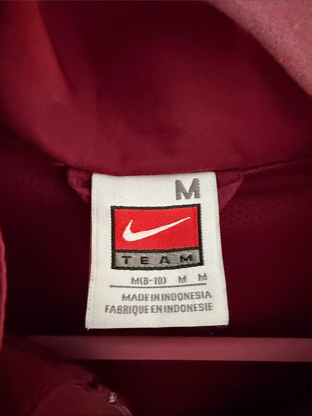 Nike Women's Maroon Varsity Jacket with Cream Shoulder Accents
